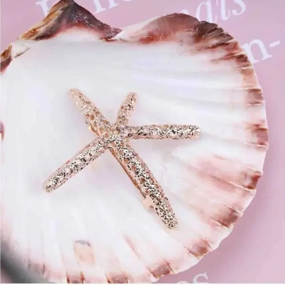 Gold starfish sea hair clip